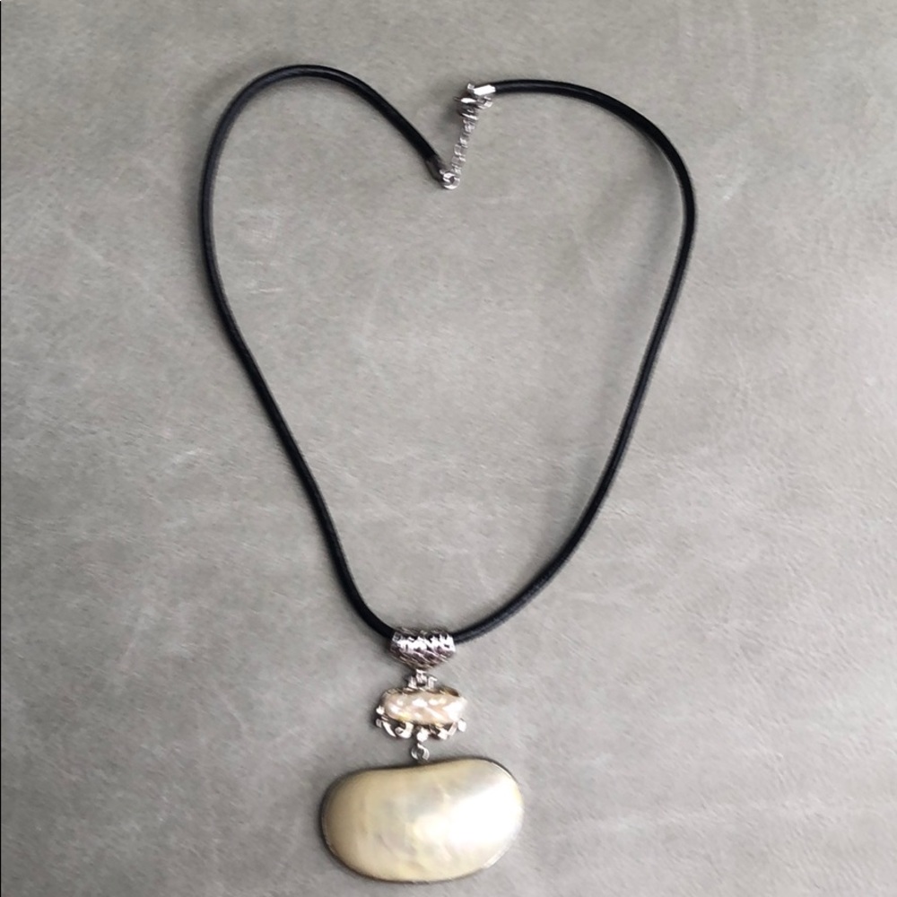 Boho mother of pearl pendant on leather cord
